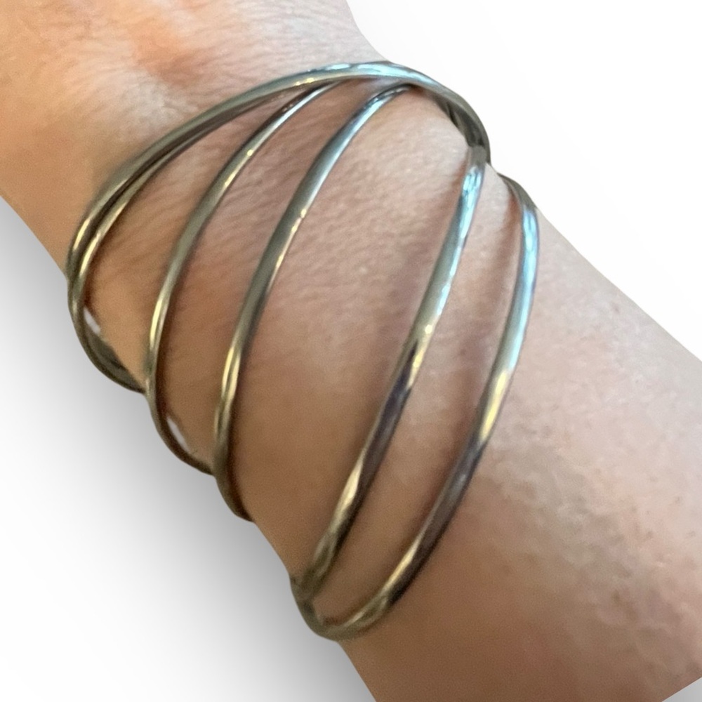 Silver Interlocking Rolling Bangle Bracelet - image 1